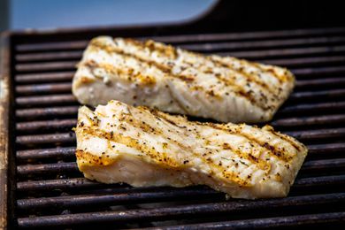 Fish on grill grates