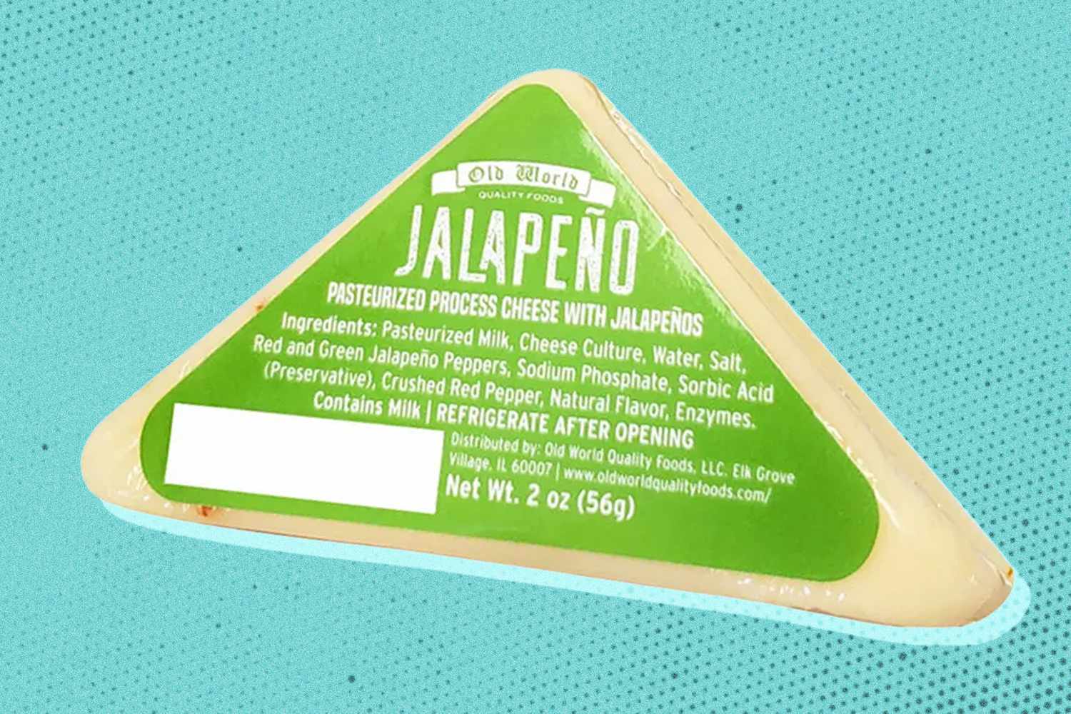 Photo of a block of Old World Jalapeno Pasturized Process Cheese from Dollar Tree on a blue speckled background