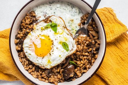 Farro, Mushroom, and Egg Grain Bowl with a Utensil