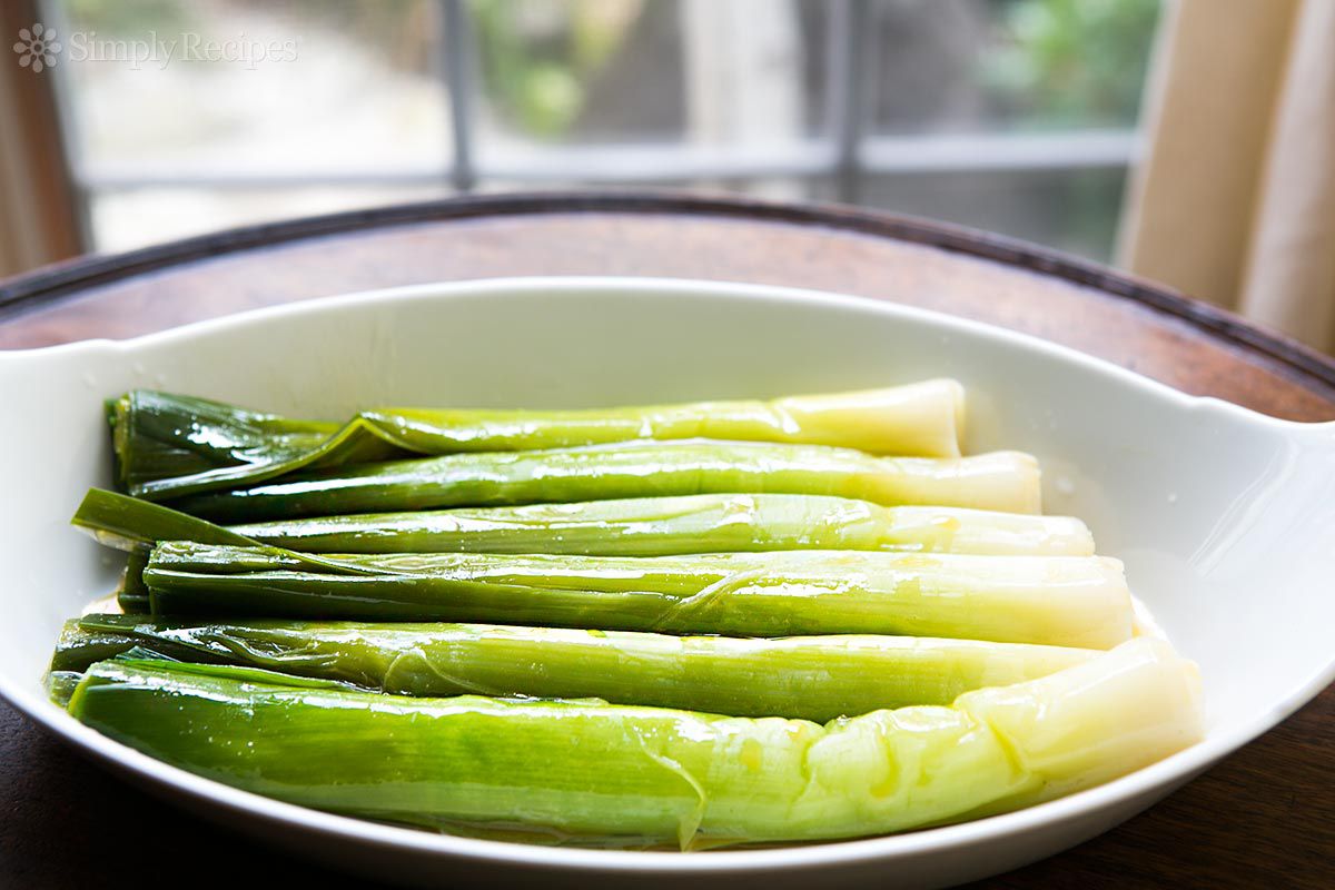 A baking dish with leeks vinaigrette
