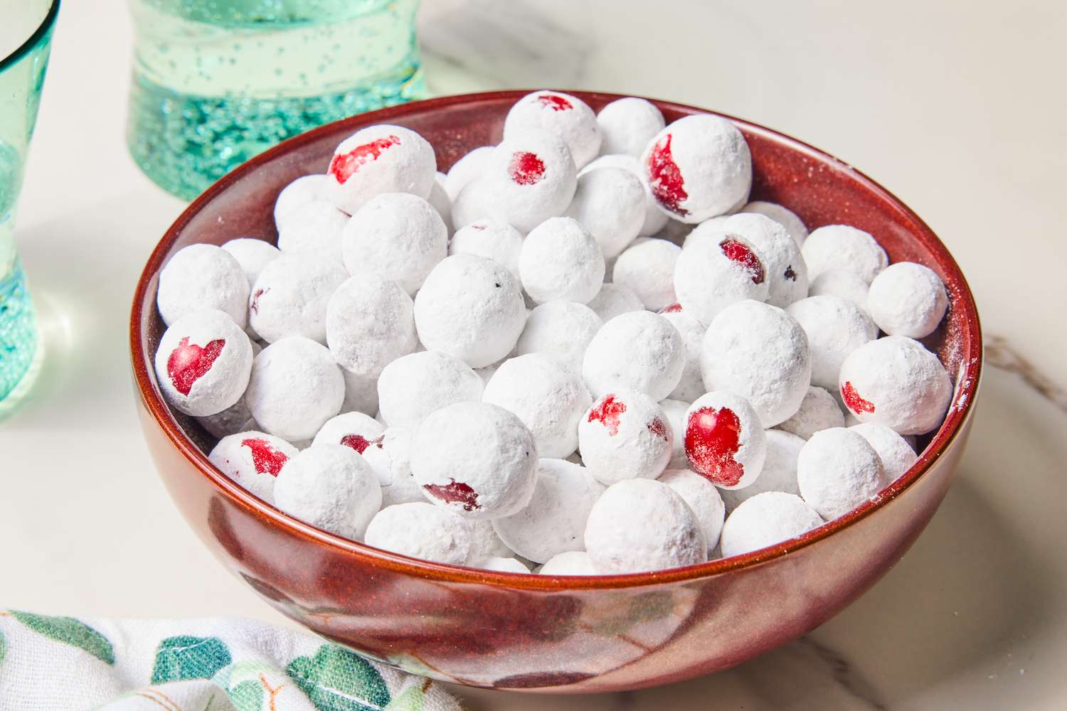 Bowl of sugared cranberries on a table