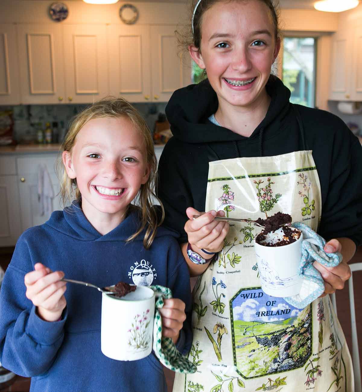 Piper and Alden eating mug brownies