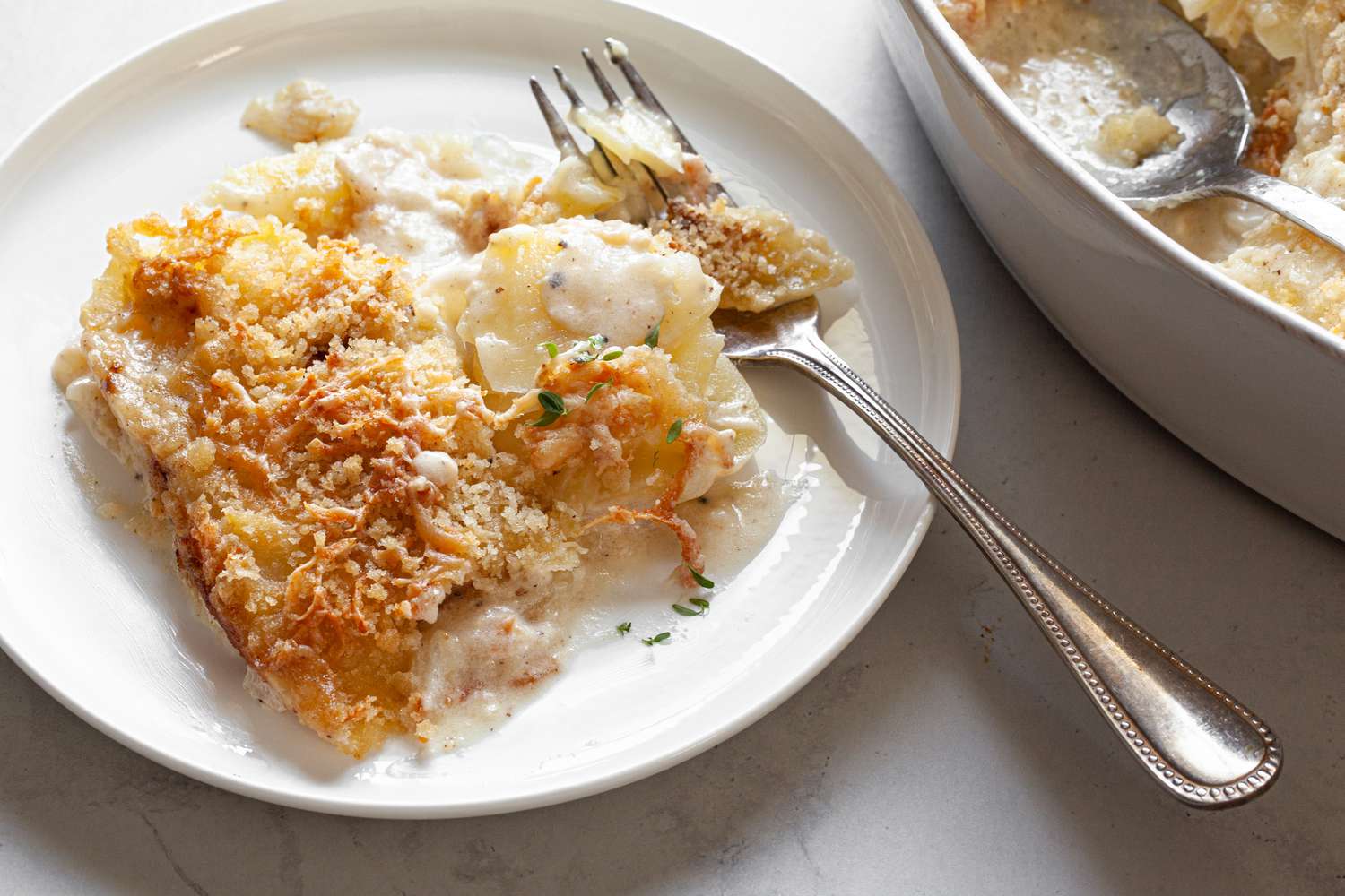 Potatoes Au Gratin on a Plate with a Fork