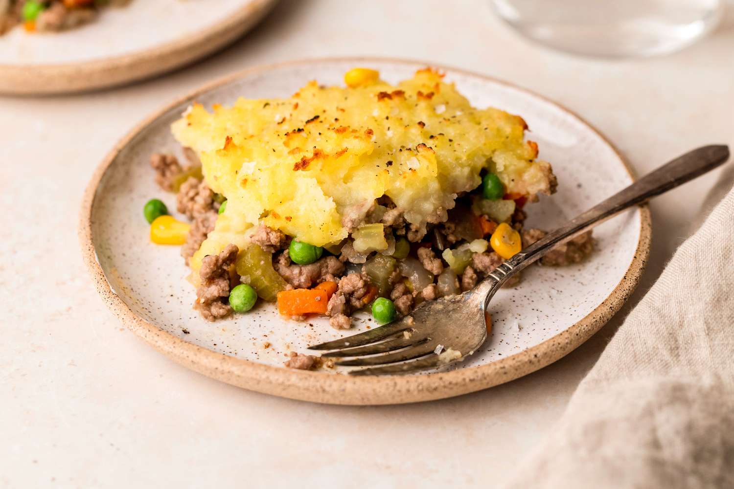 one serving of Easy Shepherd's Pie on a dish with a fork