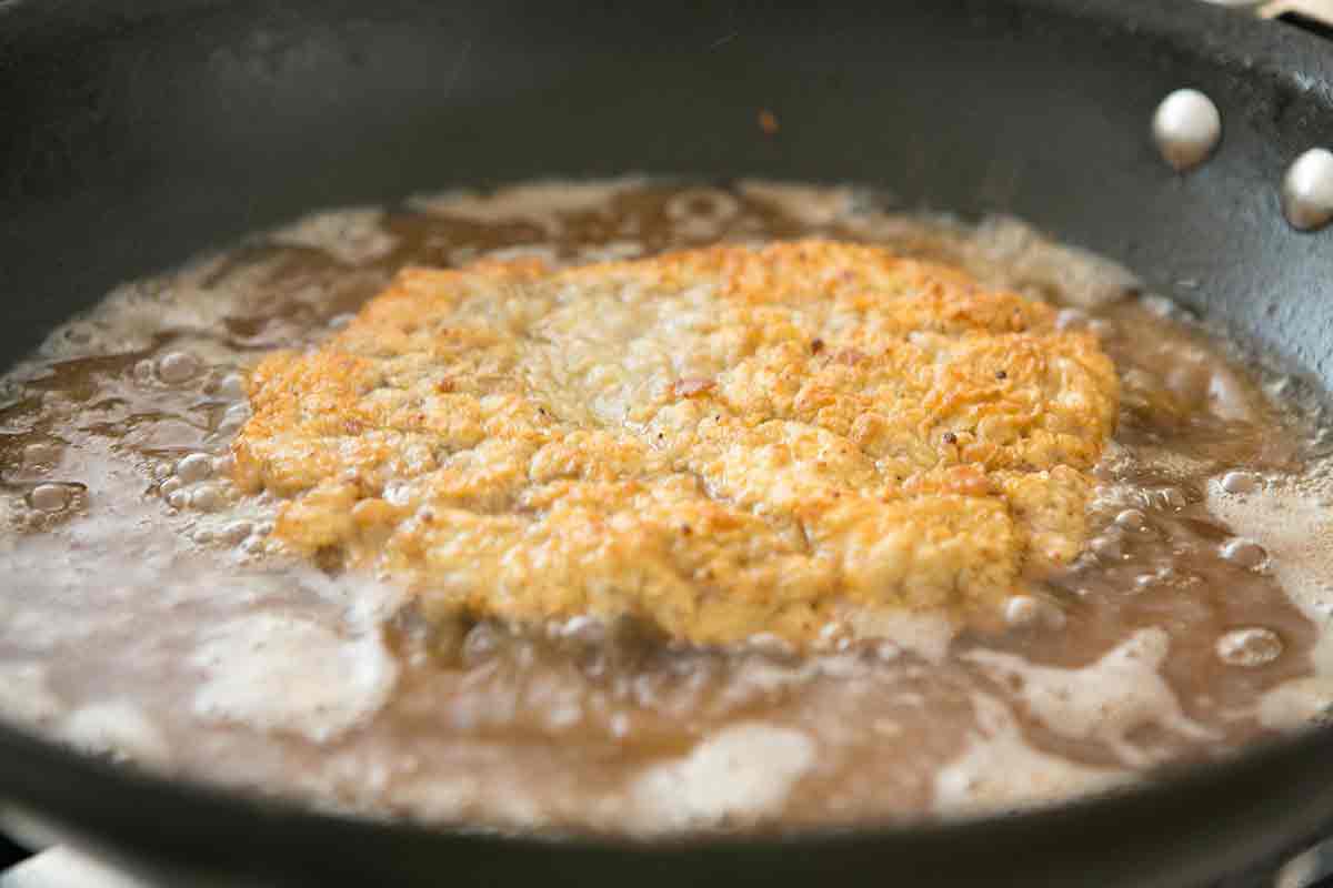 Chicken Fried Steak Cooking in Oil and Crispy