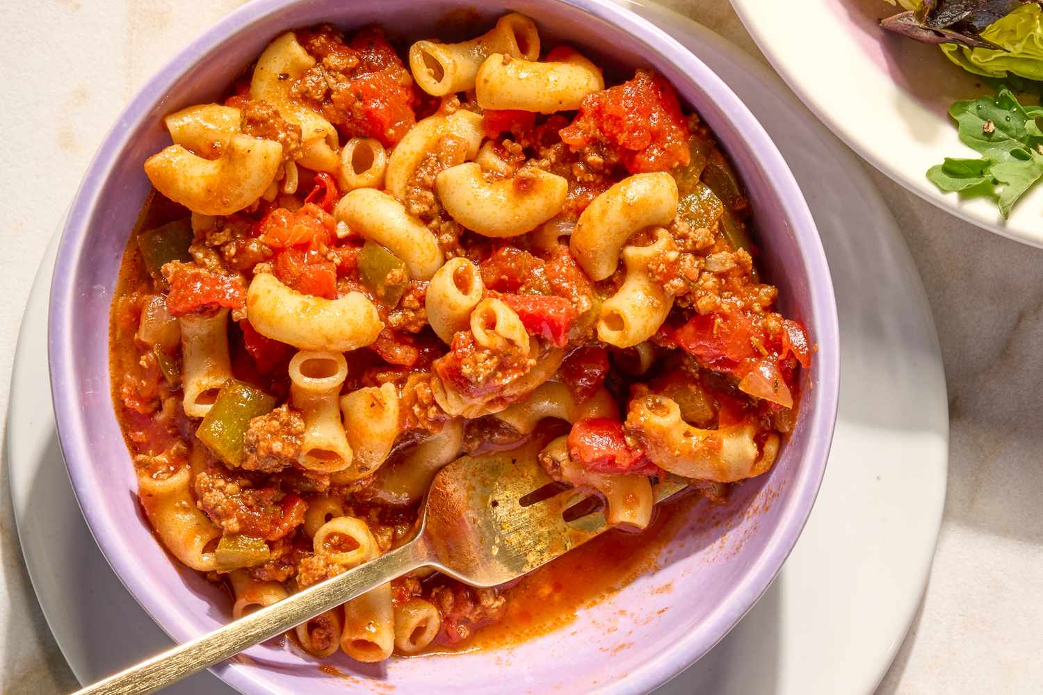close-up view of American Chop Suey with a fork