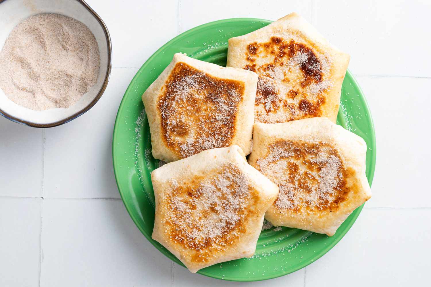 S'mores Crunchwrap on a Plate and Topped With Cinnamon Sugar