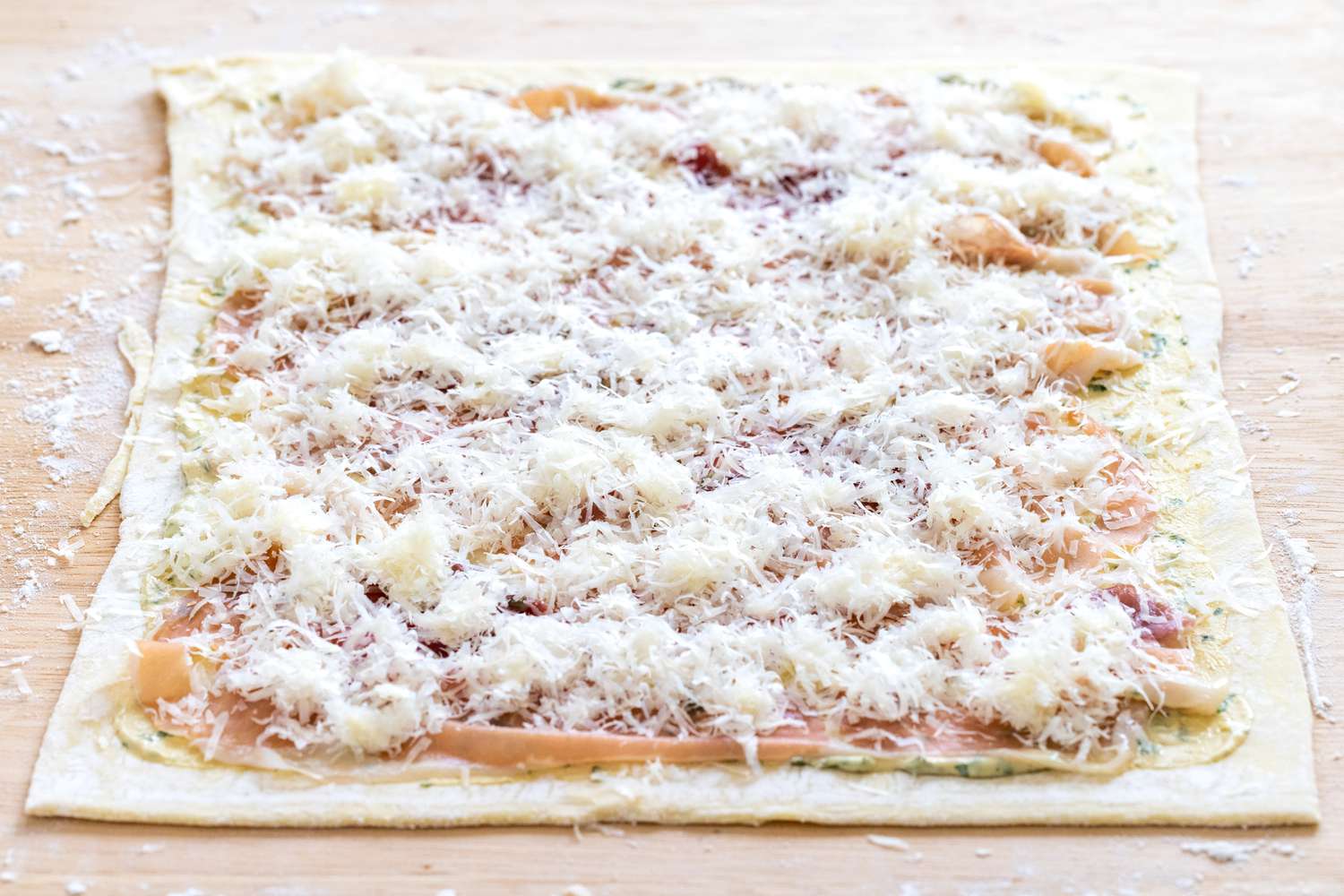 Filling puff pastry to make savory pinwheels.