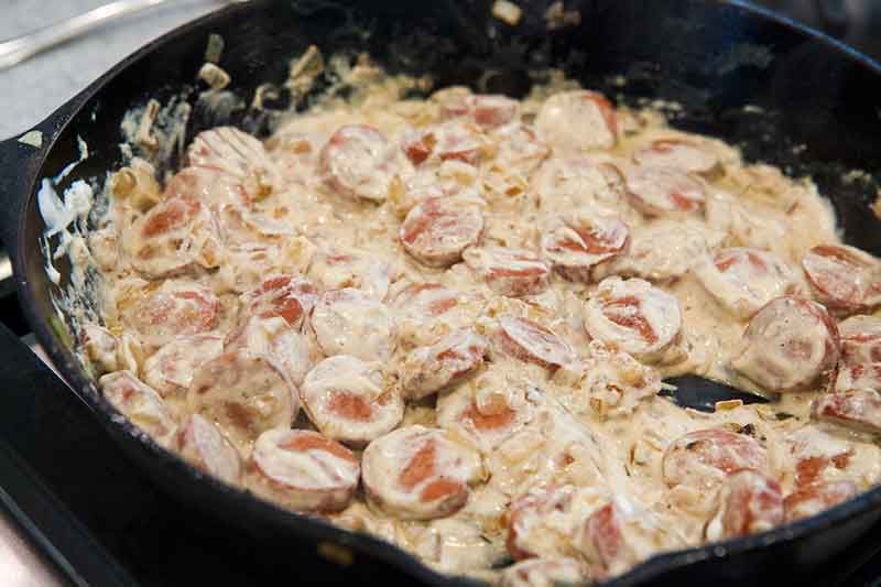 hot dogs stroganoff in a skillet