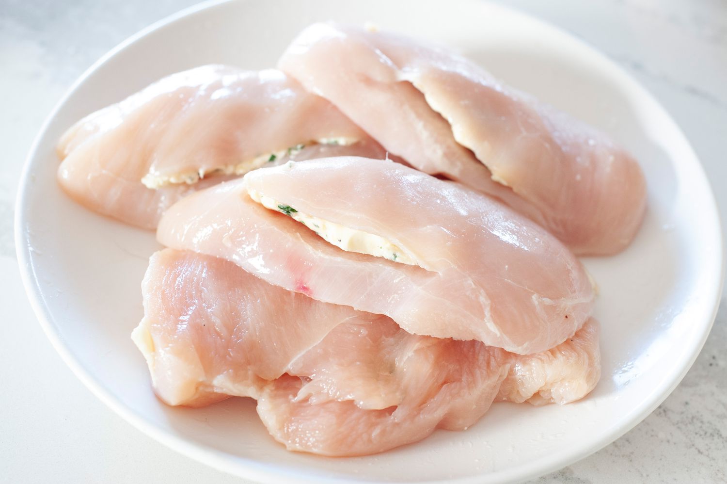 Fill pocket with herb butter.