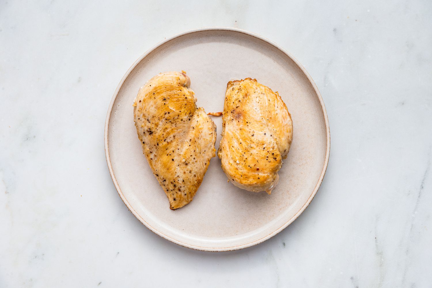 cooked chicken on a plate for chicken pomodoro recipe